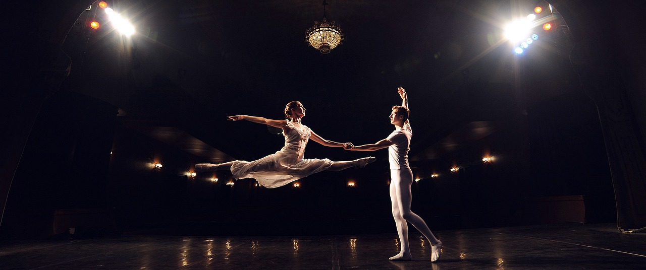 Ballerina and a male Ballet Dancer on stage in Theatre 