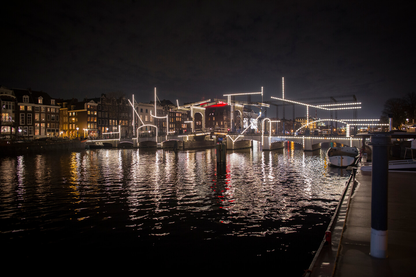 Nacht Tekening art work installed on the Skinny Bridge during Amsterdam Light Festival