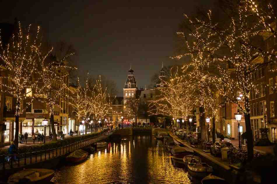 Bright lights by the canals of Amsterdam during Christmas.