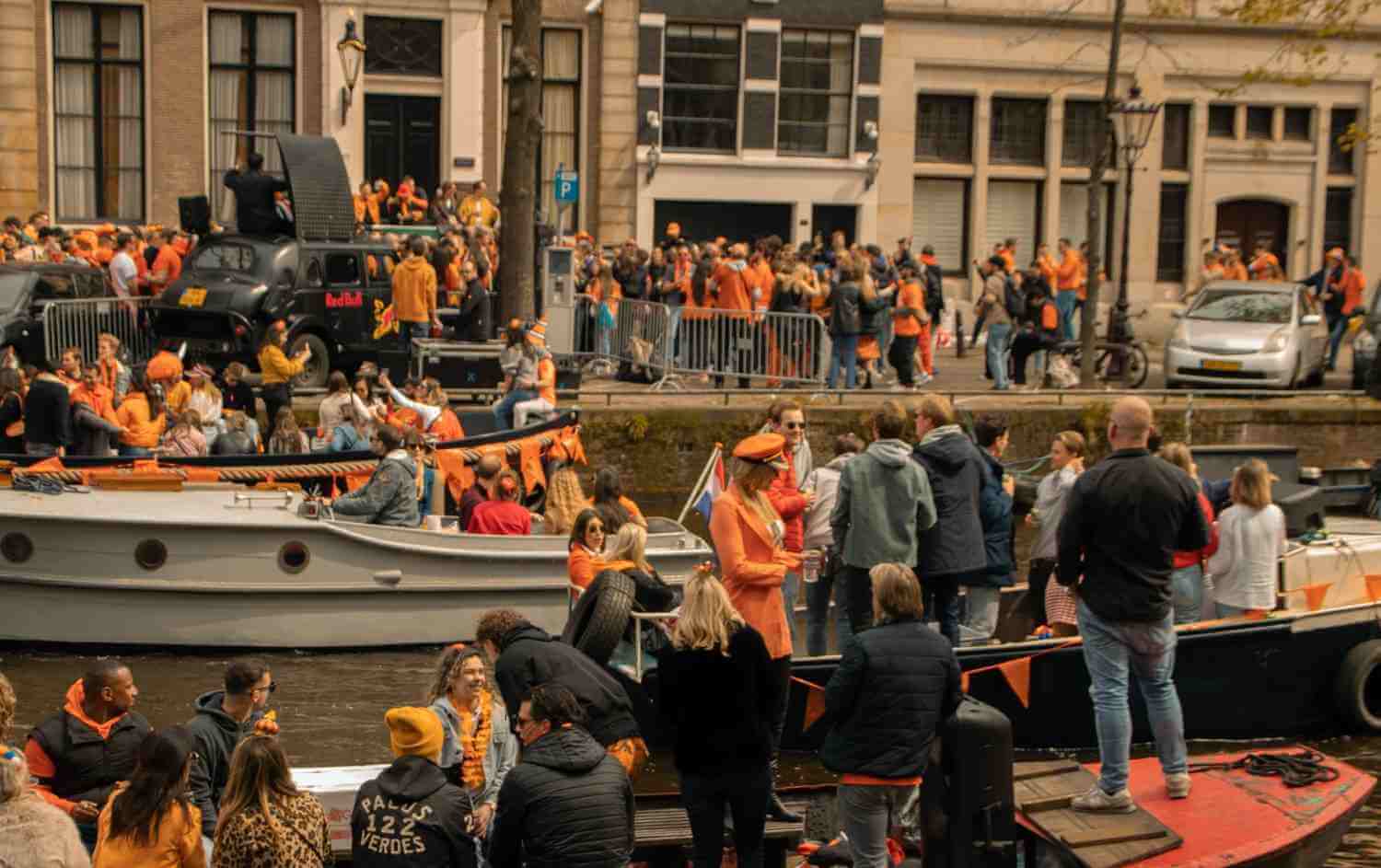 King's day Amsterdam canal scenes